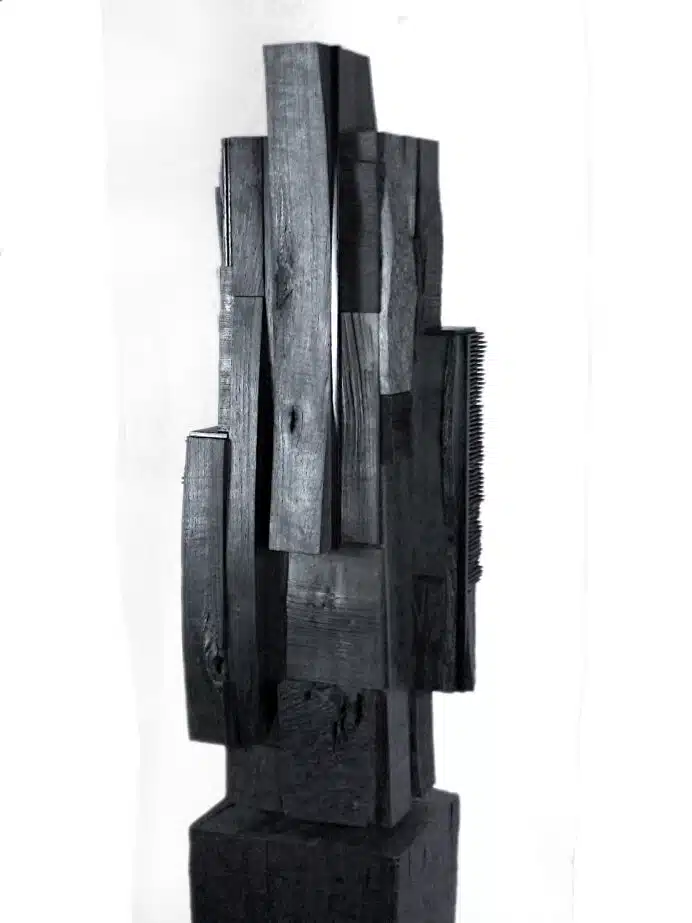 The bond. Sculpture by Julien Hardy in Oak, Walnut, Iroko, Wild Cherry, ink and wax.